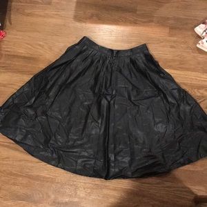 Black leather pleated skirt